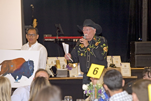 Artist Arturo Garcia with his artwork and Gary Corbett